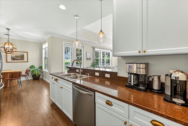 3256 Whitman Way, Tallahassee, FL 32311 - kitchen featuring dishwasher, ornamental molding, dark wood-type flooring, pendant lighting, and white cabinets