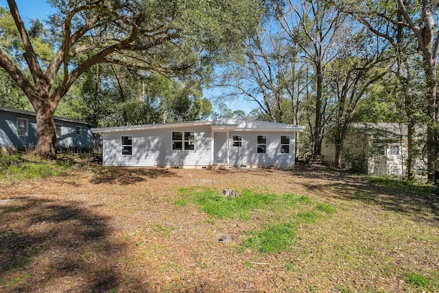 1618 Mayhew St, Tallahassee, FL 32304 - kitchen with a sink, wood counters, black microwave, stainless steel electric range, and light wood-style floors