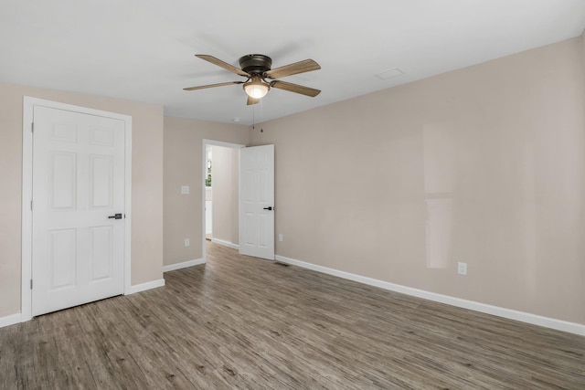 1618 Mayhew St, Tallahassee, FL 32304 - unfurnished room featuring light wood-style floors, baseboards, and ceiling fan