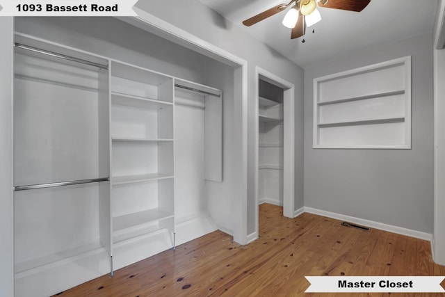closet featuring visible vents