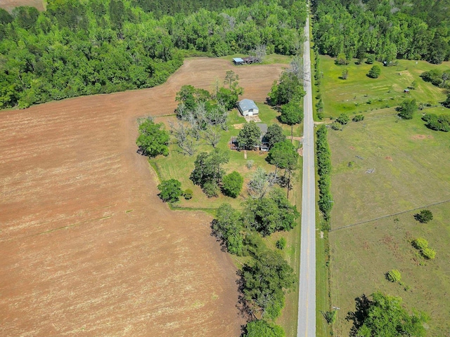 birds eye view of property featuring a rural view