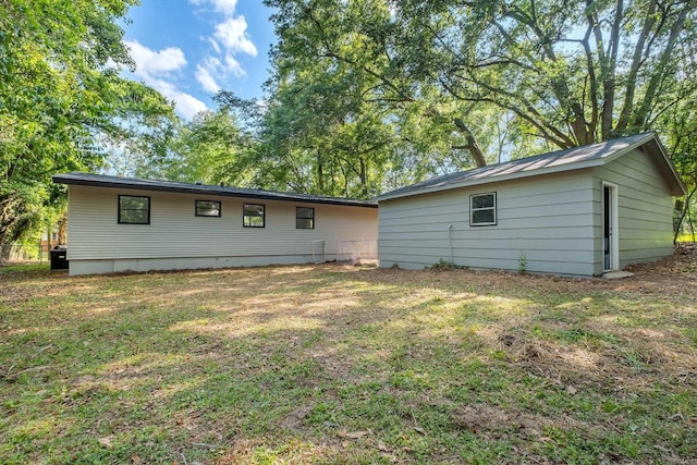 2204 Berkshire Dr, Tallahassee, FL 32304 - back of property featuring a yard