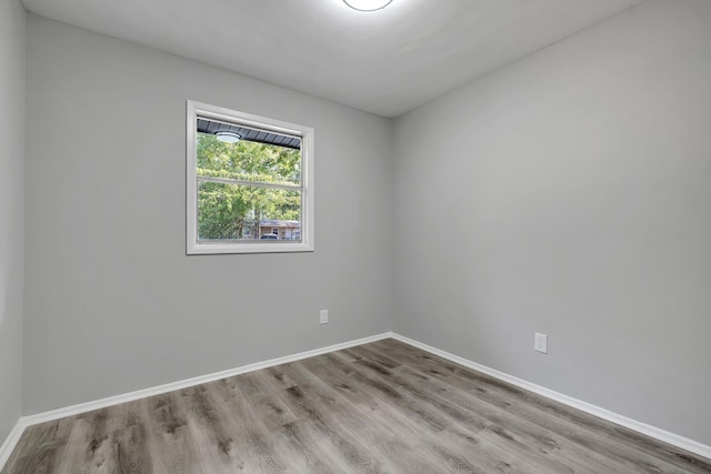 2204 Berkshire Dr, Tallahassee, FL 32304 - empty room featuring wood finished floors and baseboards