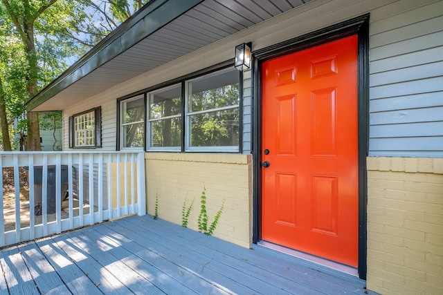 2204 Berkshire Dr, Tallahassee, FL 32304 - doorway to property with a wooden deck