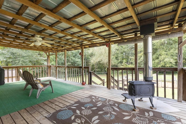 wooden deck featuring ceiling fan