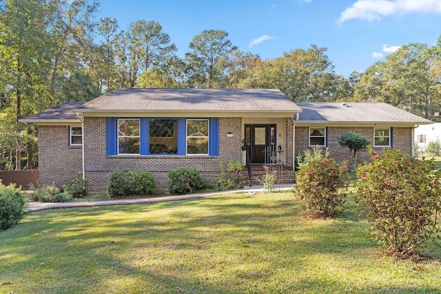 ranch-style home with a front lawn