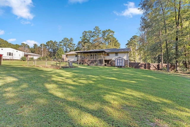 view of yard with a storage shed