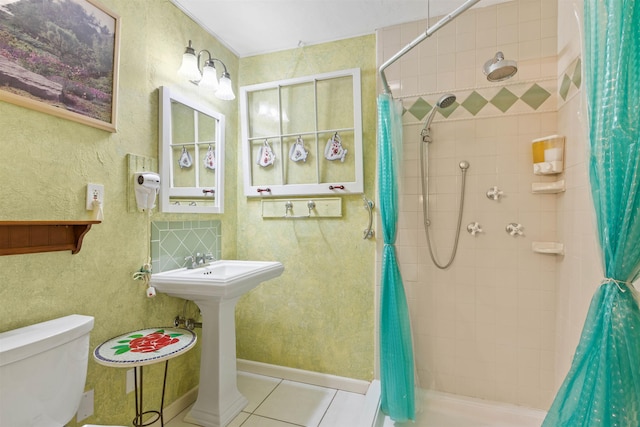 bathroom with tile patterned flooring, toilet, and a shower with shower curtain