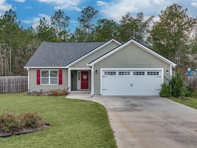 single story home featuring a garage and a front yard