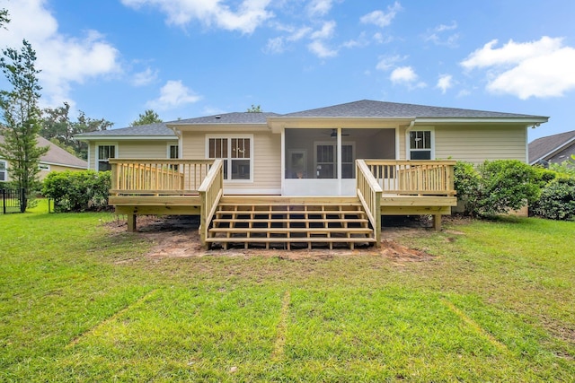3574 Strolling Way, Tallahassee, FL 32311 - back of property with a deck, a sunroom, stairway, and a yard