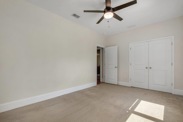 3574 Strolling Way, Tallahassee, FL 32311 - unfurnished bedroom featuring light colored carpet, a closet, and ceiling fan