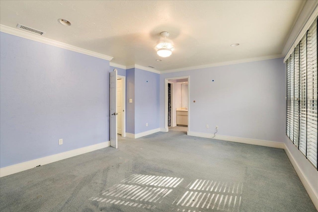 1816 Atlantis Pl, Tallahassee, FL 32303 - spare room with baseboards, visible vents, carpet floors, and ornamental molding