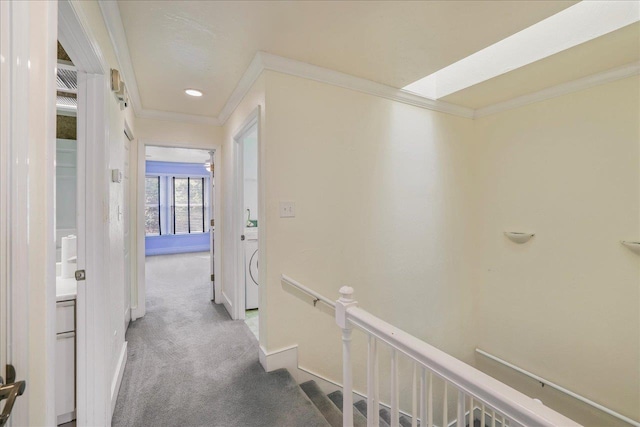 1816 Atlantis Pl, Tallahassee, FL 32303 - corridor featuring baseboards, carpet floors, ornamental molding, and an upstairs landing