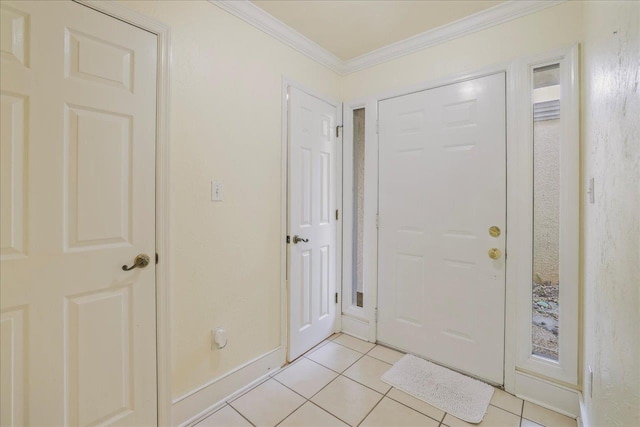 1816 Atlantis Pl, Tallahassee, FL 32303 - foyer entrance with light tile patterned floors, baseboards, and crown molding
