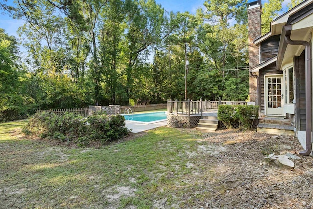 view of yard featuring a pool side deck