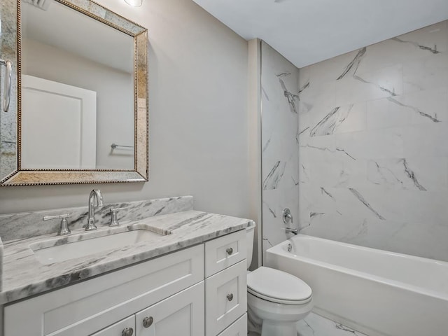 full bathroom with tiled shower / bath combo, toilet, and vanity