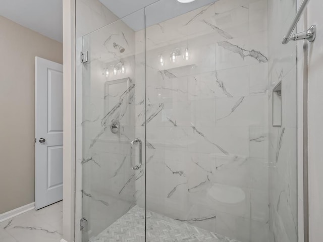 bathroom featuring an enclosed shower