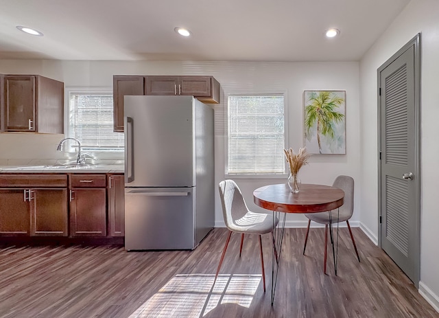 110 S Hinson Cir, Havana, FL 32333 - kitchen featuring freestanding refrigerator, a sink, light countertops, dark wood-style floors, and recessed lighting