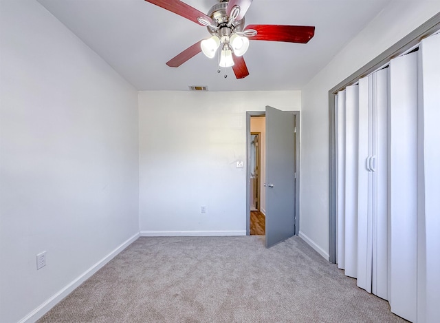 110 S Hinson Cir, Havana, FL 32333 - unfurnished bedroom featuring carpet flooring, baseboards, and a ceiling fan