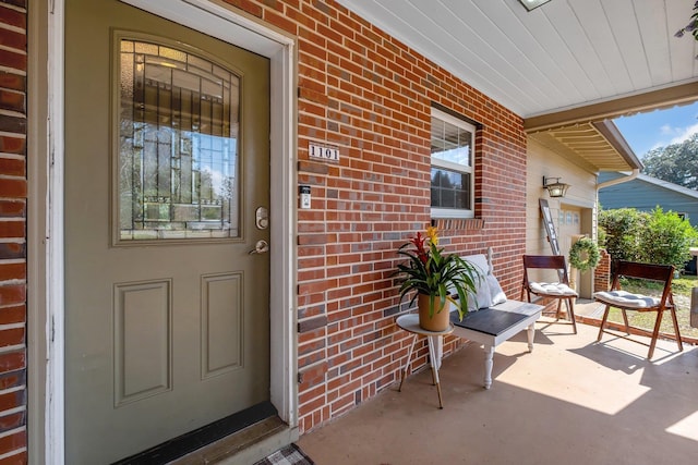 entrance to property with covered porch