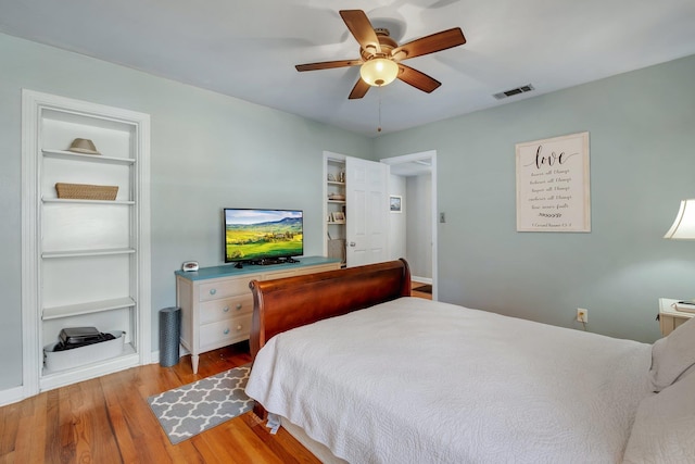 bedroom featuring light hardwood / wood-style flooring and ceiling fan