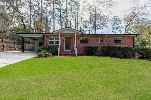 single story home with a front lawn and a carport