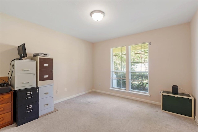 home office featuring light carpet