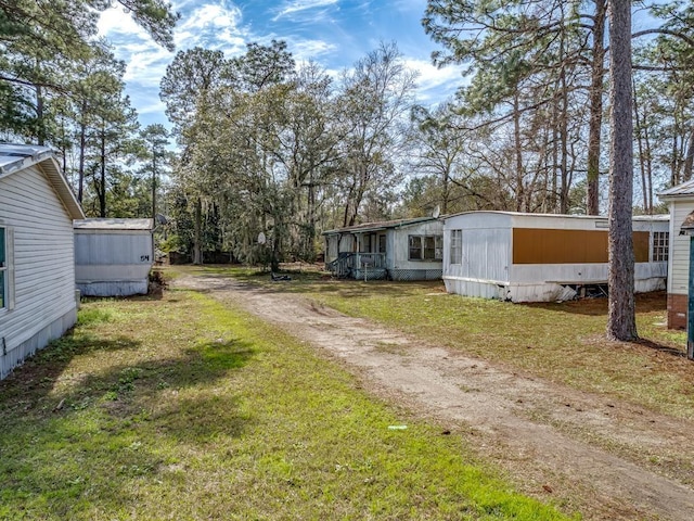 exterior space with a front lawn