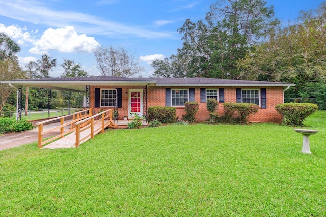 ranch-style home with a front lawn