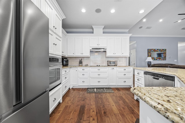 kitchen featuring white cabinetry, stainless steel appliances, light stone counters, backsplash, and crown molding