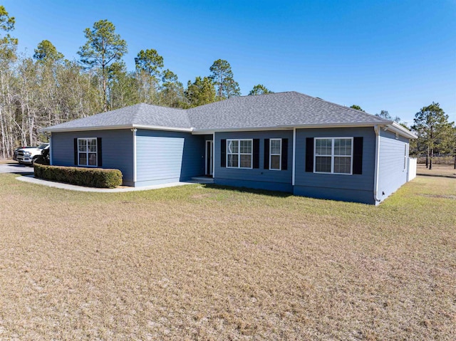 ranch-style home with a front lawn