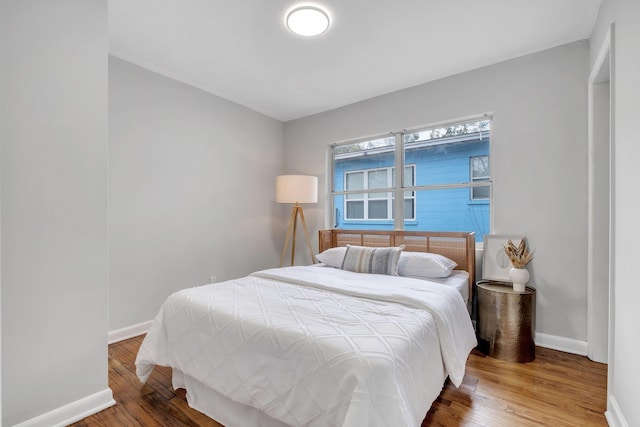 bedroom featuring hardwood / wood-style flooring