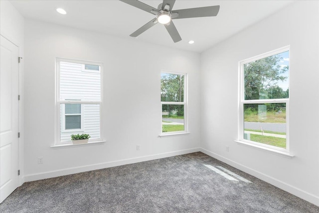 spare room featuring carpet flooring, ceiling fan, baseboards, and recessed lighting