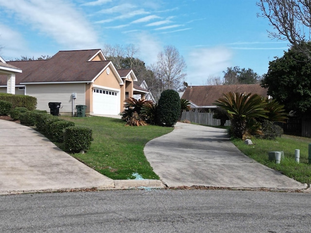 single story home featuring a garage and a front lawn