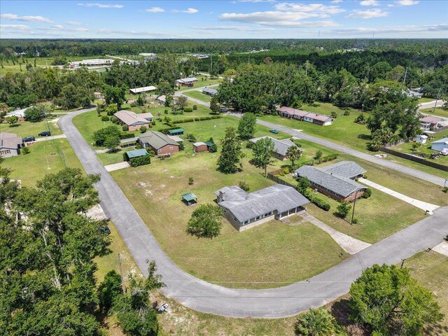 203 Forest Cir, Perry, FL 32347 - aerial overview of property's location with a heavily wooded area