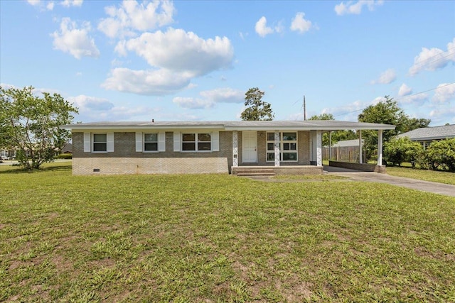 203 Forest Cir, Perry, FL 32347 - view of front of house with driveway, brick siding, a carport, a front lawn, and crawl space