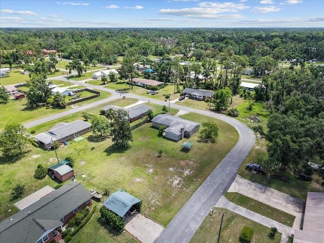 203 Forest Cir, Perry, FL 32347 - aerial view of residential area with a heavily wooded area