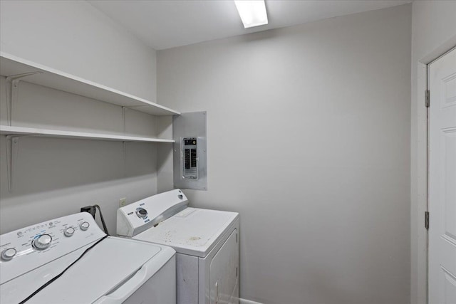 203 Forest Cir, Perry, FL 32347 - washroom with electric panel and independent washer and dryer