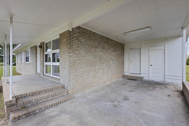 203 Forest Cir, Perry, FL 32347 - view of patio featuring an attached carport