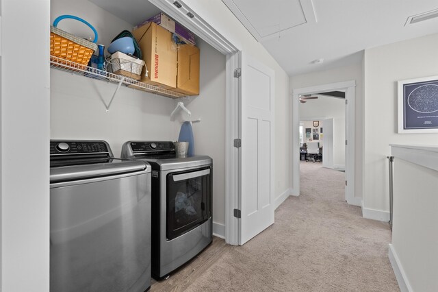 2848 Crestline Rd, Tallahassee, FL 32308 - washroom featuring attic access, washer and dryer, and light colored carpet