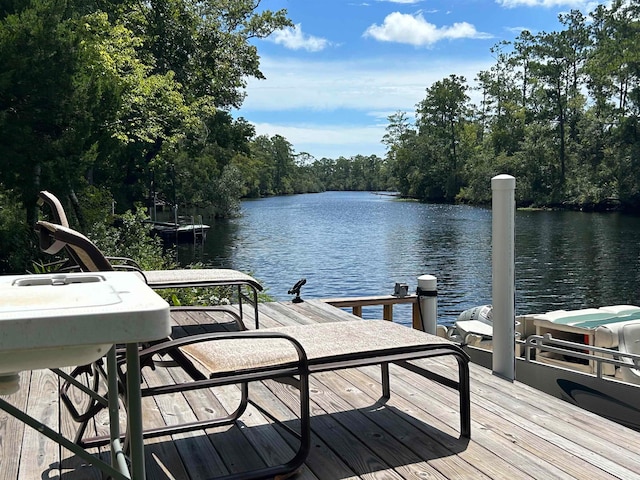 view of dock featuring a water view