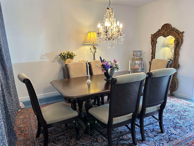 dining room featuring a chandelier