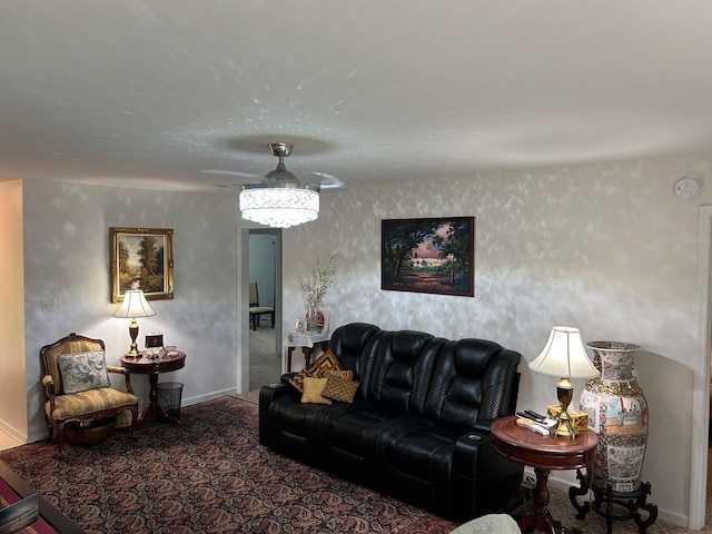 carpeted living room featuring ceiling fan