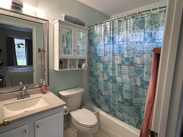 full bathroom with vanity, toilet, and shower / tub combo