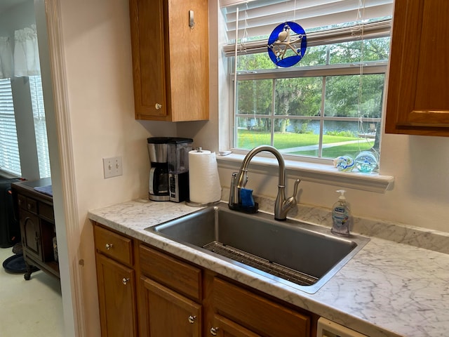 kitchen with plenty of natural light and sink