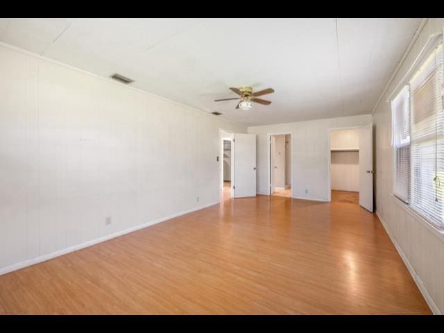 10168 NE Colin Kelly Hwy, Pinetta Madison County, FL 32350 - spare room featuring wood finished floors and ceiling fan