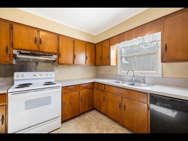 10168 NE Colin Kelly Hwy, Pinetta Madison County, FL 32350 - kitchen with white electric range, under cabinet range hood, black dishwasher, a sink, and brown cabinets