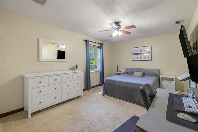3822 Leane Dr, Tallahassee, FL 32309 - bedroom with light colored carpet, baseboards, ceiling fan, and a desk