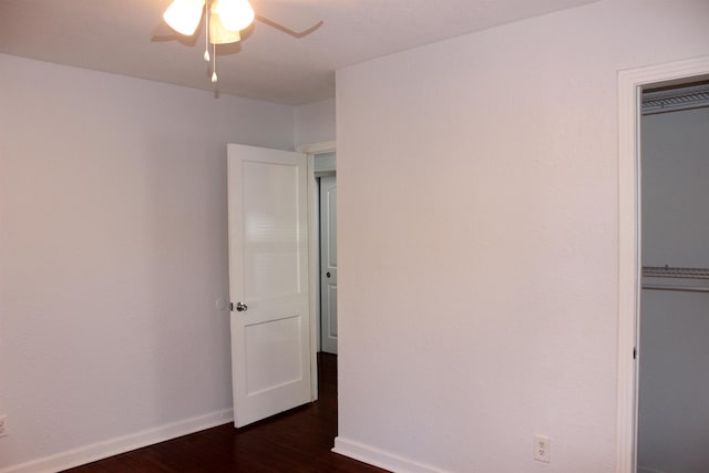 837 Dent St, Tallahassee, FL 32304 - unfurnished bedroom featuring baseboards, a closet, ceiling fan, and dark wood-style flooring