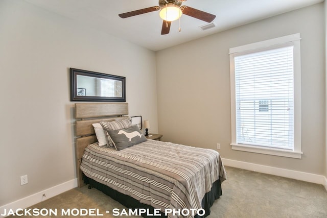 carpeted bedroom featuring ceiling fan